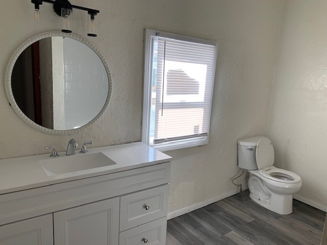 2284 Cranberry Highway Wareham, MA 02576 - Photo 9 of 12 a bathroom with a toilet sink and mirror