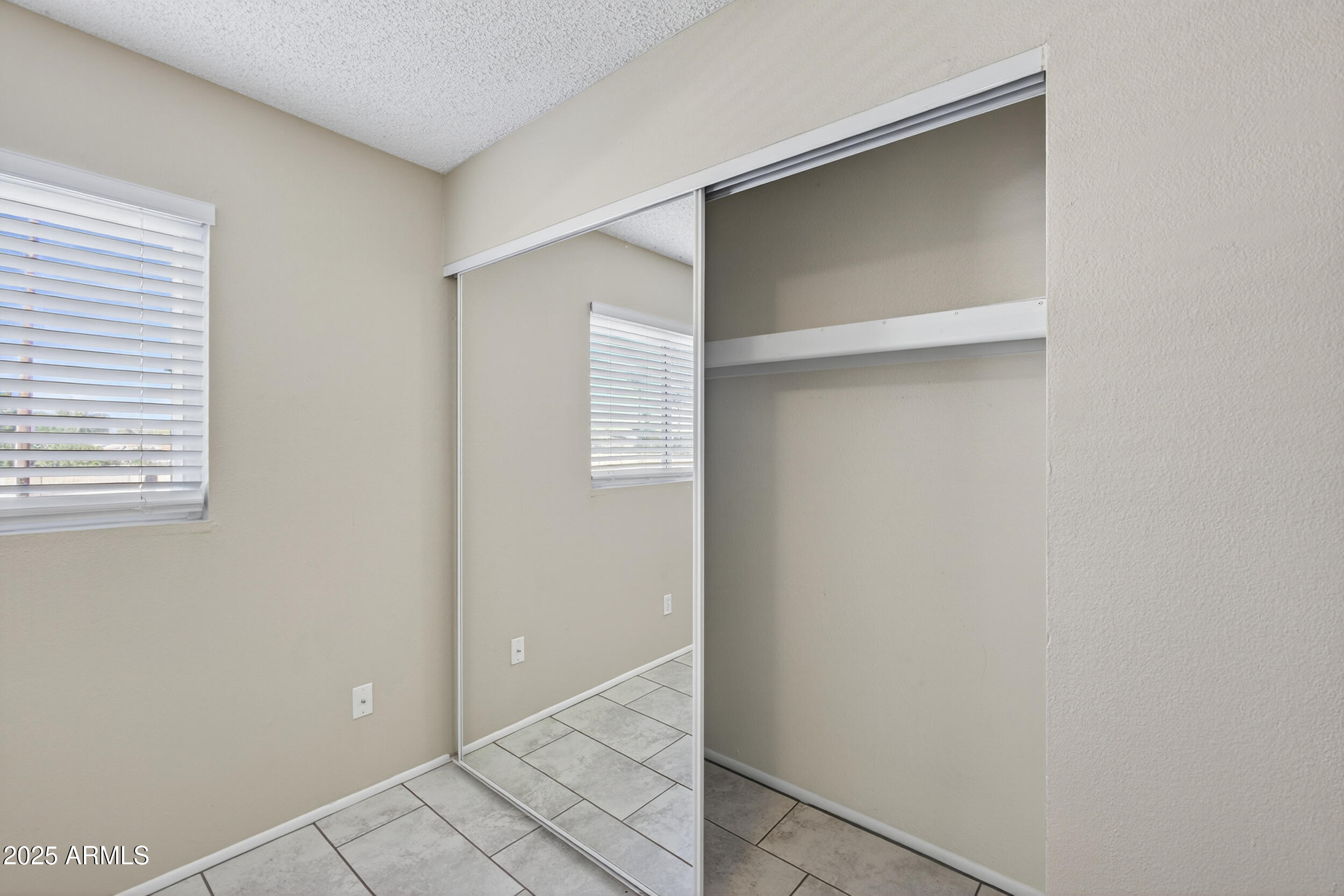 860 East Brown Road, Unit 67 Mesa, AZ 85203 - Photo 15 of 27 a view of an empty room