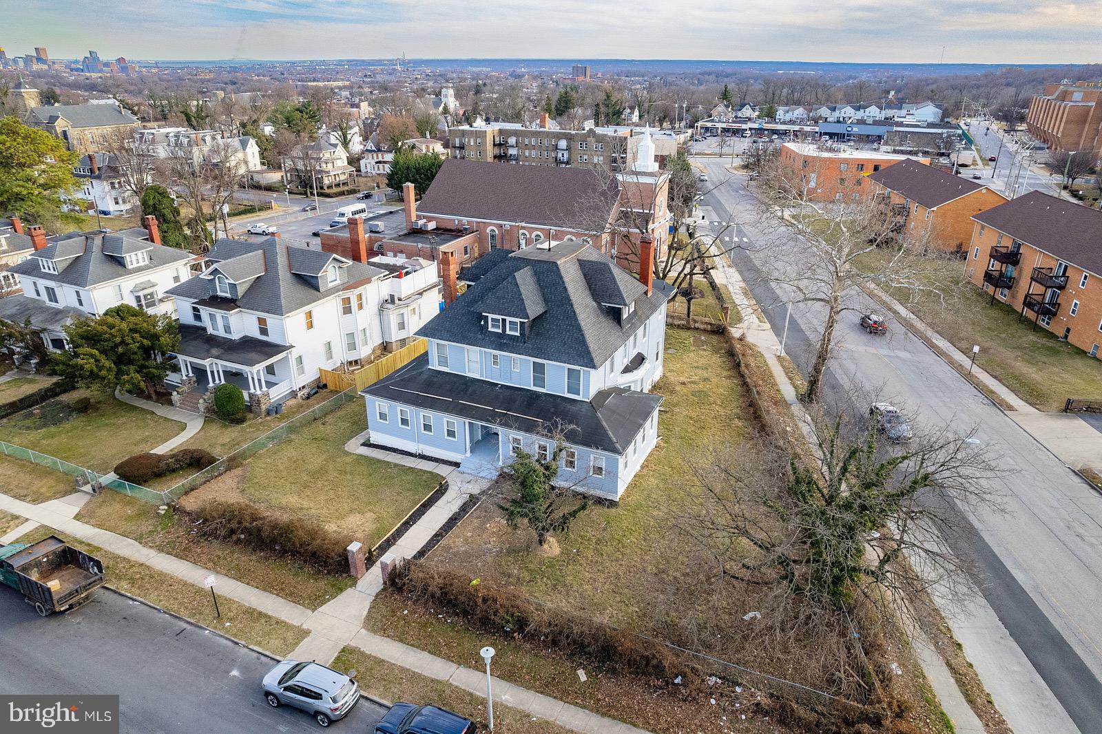 3407 Elgin Avenue, Unit 1 Baltimore, MD 21216 - Photo 1 of 15 an aerial view of residential houses with outdoor space