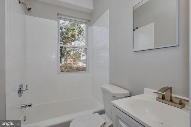a bathroom with a sink and a bathtub