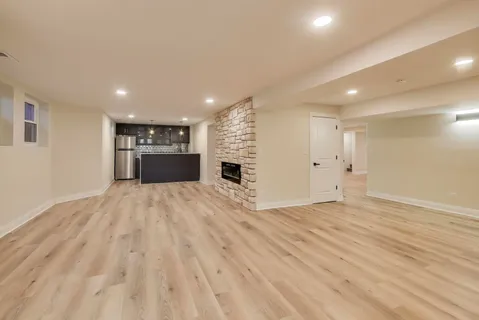 a view of a kitchen with sink and washing machine