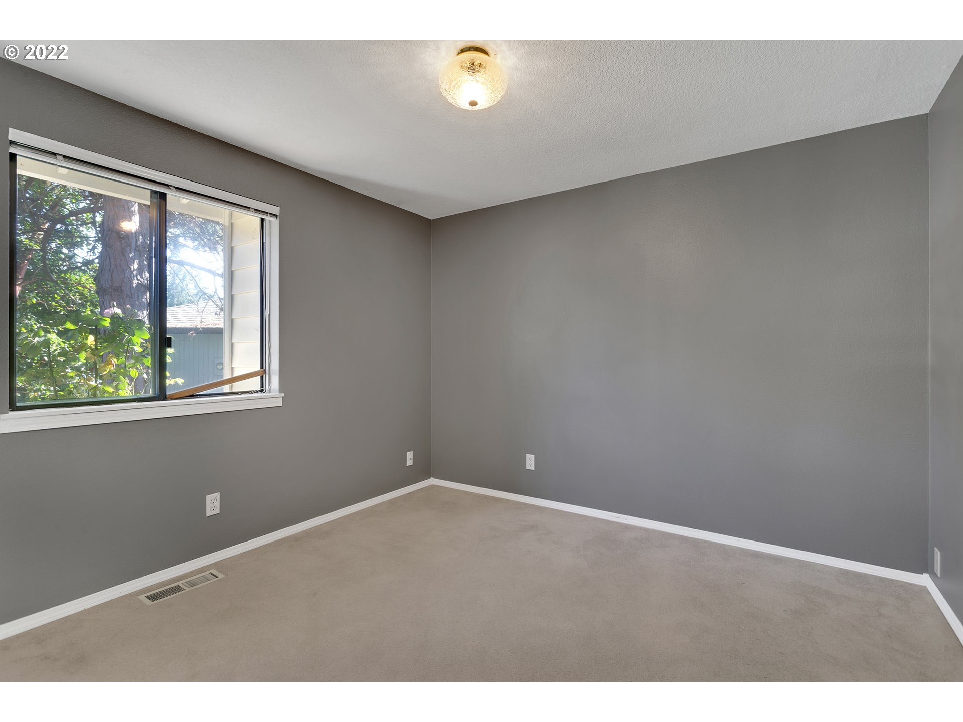 9139 Southwest Raritan Court Tualatin, OR 97062 - Photo 16 of 26 Bedroom