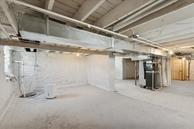 a view of a room with wooden walls