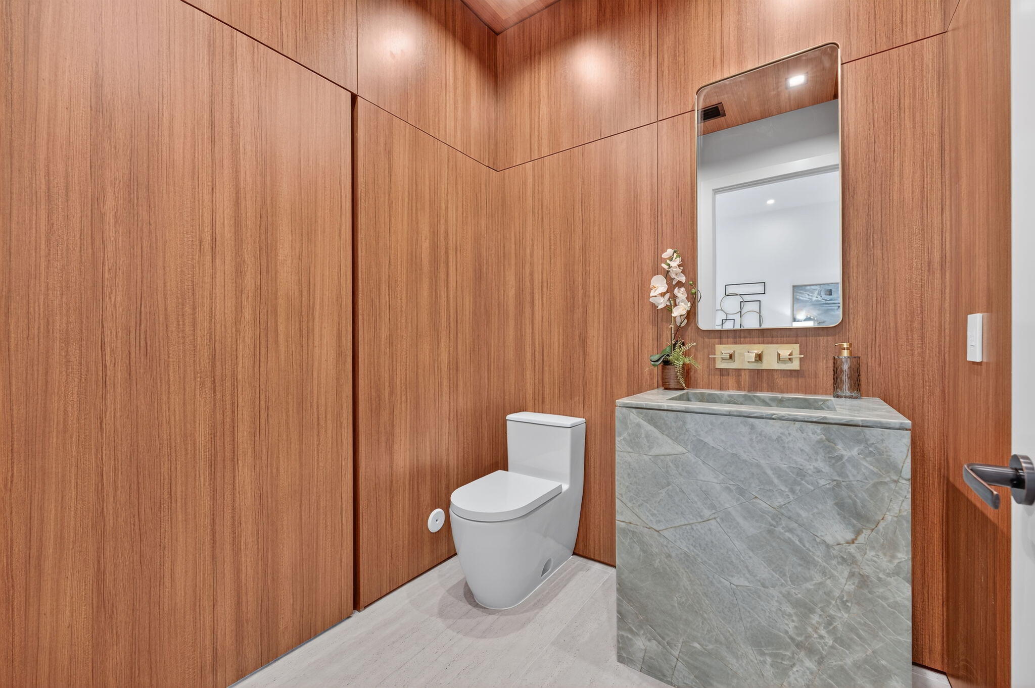 721 Northeast 34th Street Boca Raton, FL 33431 - Photo 44 of 76 a bathroom with a toilet and a shower curtain