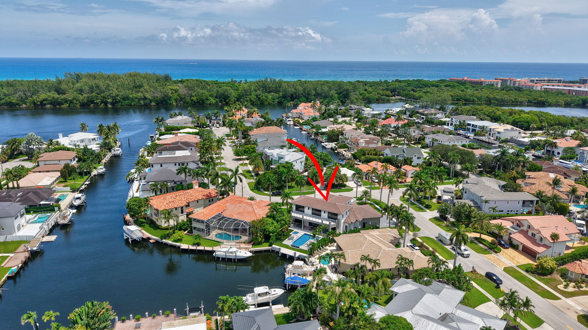 721 Northeast 34th Street Boca Raton, FL 33431 - Photo 73 of 76 an aerial view of residential houses with outdoor space and river