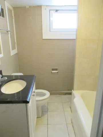 a view of empty room with windows