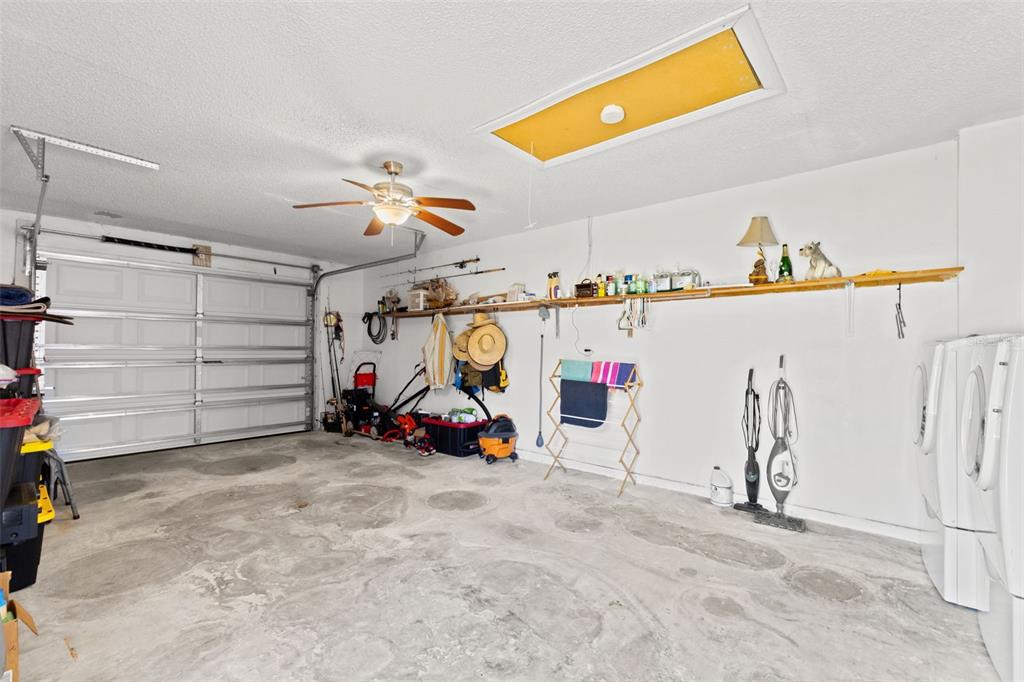 8306 Needles Drive Hudson, FL 34667 - Photo 35 of 39 a view of a garage with equipment