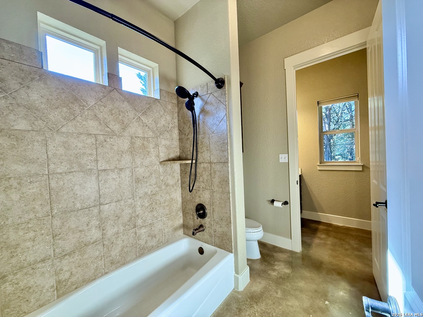 757 Copper Rim Spring Branch, TX 78070 - Photo 30 of 50 a bathroom with a tub and a shower