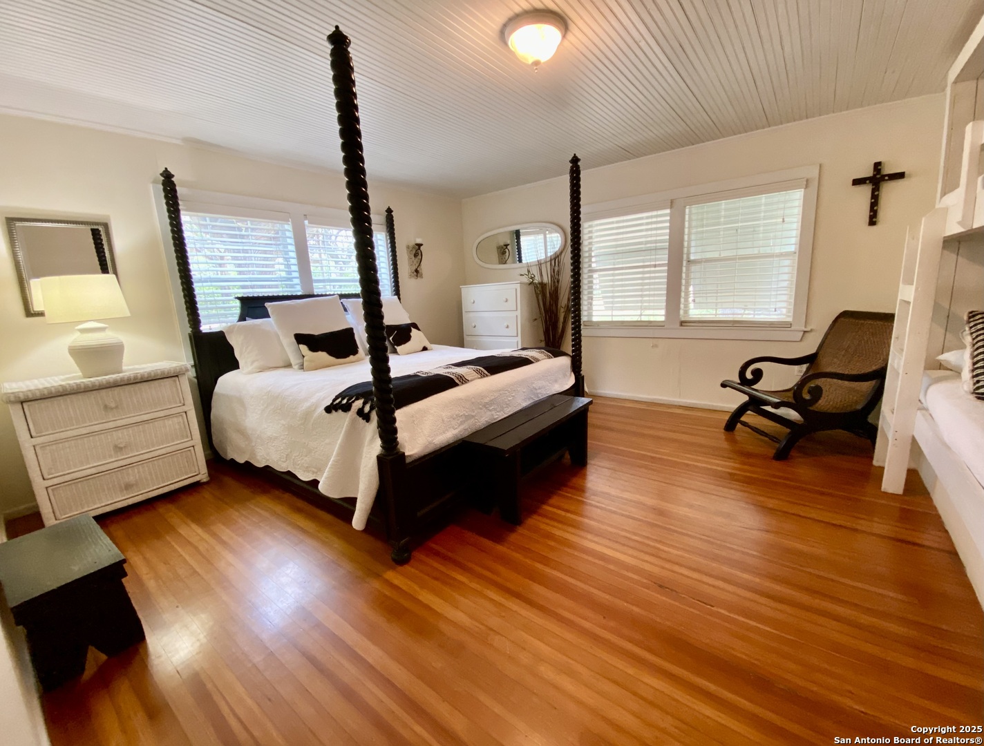 512 County Road 348 Concan, TX 78838 - Photo 19 of 39 a bedroom with bed and window