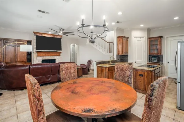 a kitchen with cabinets a sink outdoor counter space and stainless steel appliances