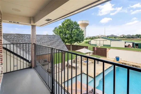 a view of a balcony with city view