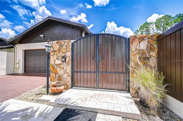 a front view of a house with a garage