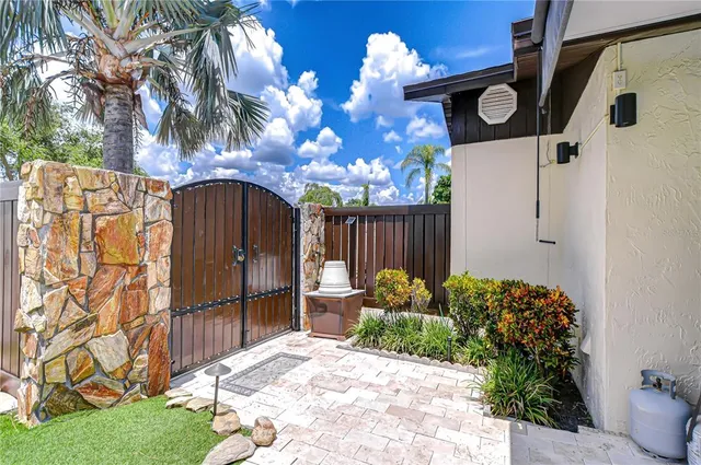 a view of a swimming pool with a patio
