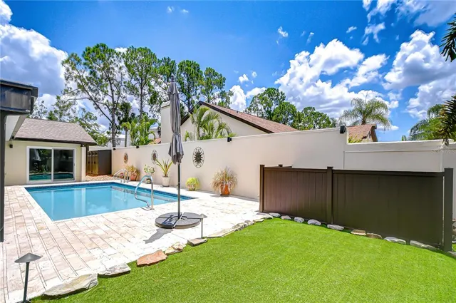 a view of a garden with a fountain