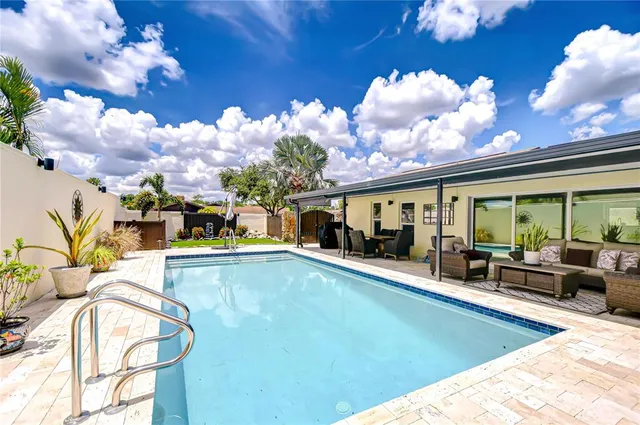 a potted plant in front of a door