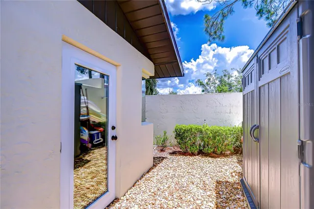 a view of a lake with a yard