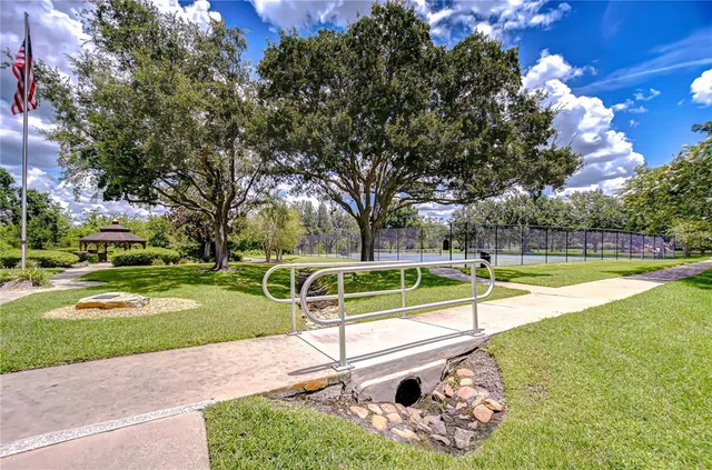 a view of a playground with a swimming pool