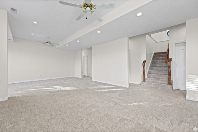 4117 North Wolf Ridge Circle Eden, UT 84310 - Photo 29 of 63 Spacious carpeted room featuring recessed lighting and two ceiling fans