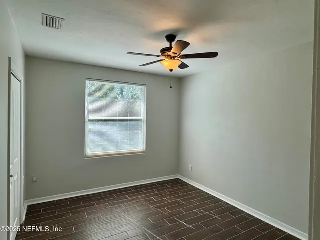 a bathroom with a toilet a sink and bath tub