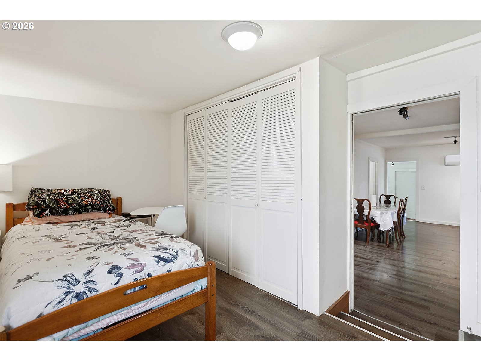 320 East Steuben Street Bingen, WA 98605 - Photo 19 of 41 a bedroom with a bed and a table