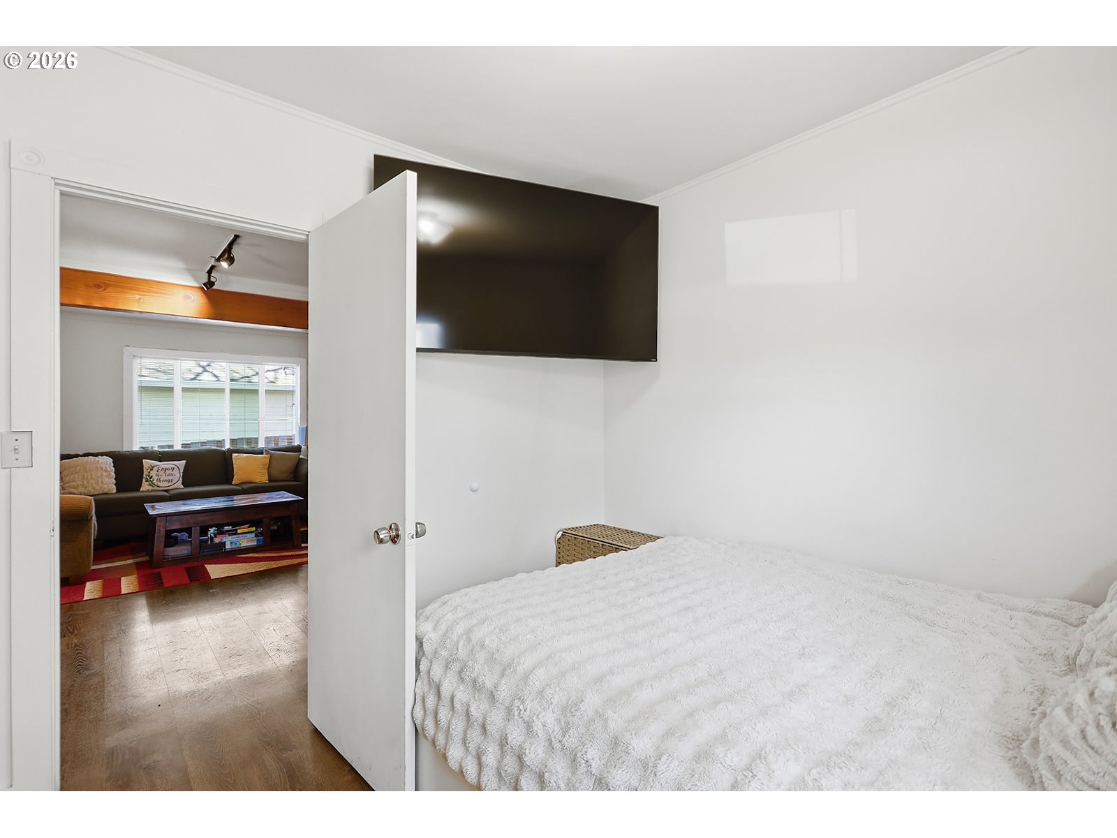 320 East Steuben Street Bingen, WA 98605 - Photo 20 of 41 a bedroom with a bed and a flat screen tv