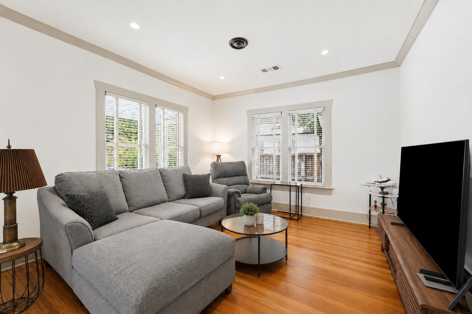1114 Merrill Street Houston, TX 77009 - Photo 6 of 34 Living room with hardwood floors, recessed lighting, and abundant natural light.