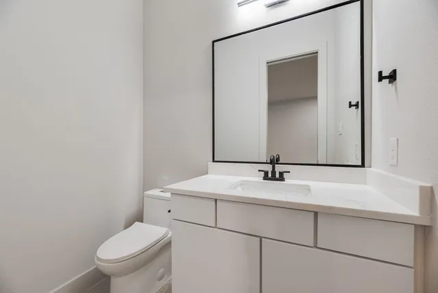 a bathroom with a sink and a toilet