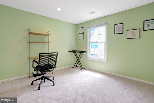a bathroom with a sink mirror toilet and bathtub