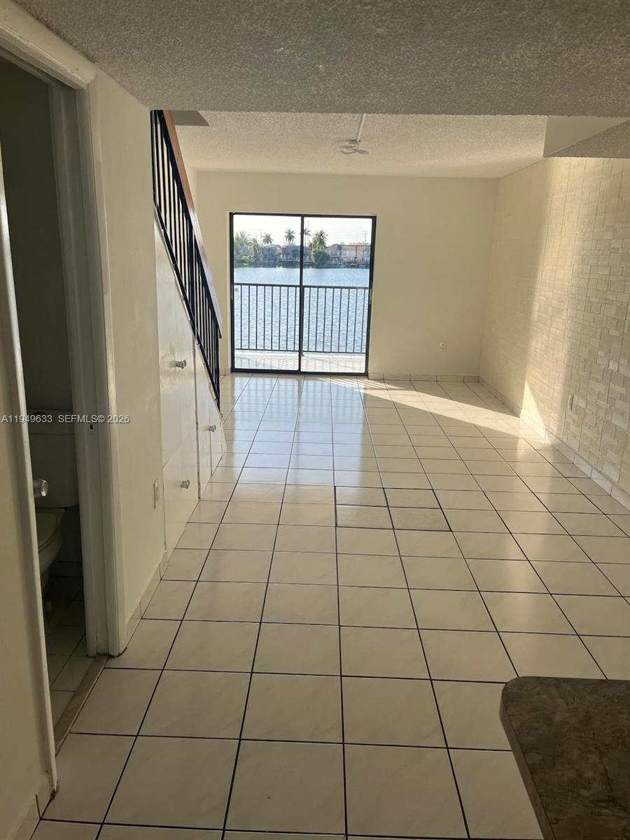 5580 West 26th Court, Unit 208 Hialeah, FL 33016 - Photo 12 of 12 a view of an empty room with a window