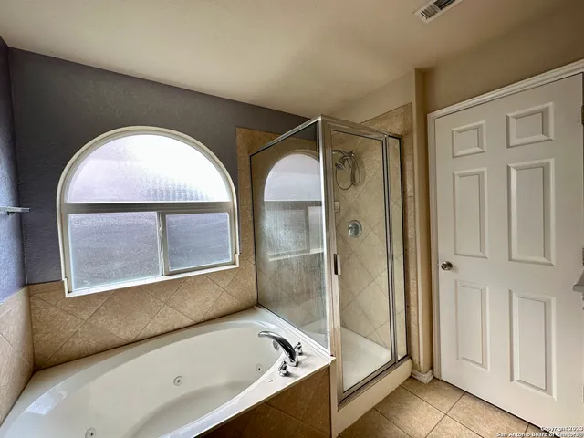 a house view with a garden space