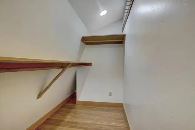 a view of a house with a small yard