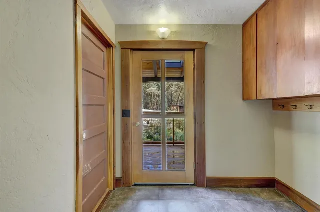 a kitchen with stainless steel appliances granite countertop a stove and a refrigerator