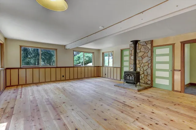 a kitchen with granite countertop a sink and a window