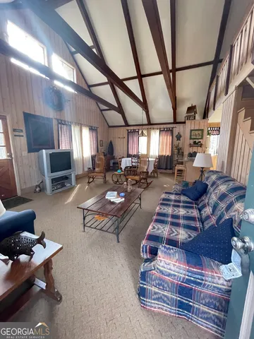 a gym hall with furniture