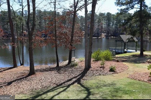 a view of a backyard of the house