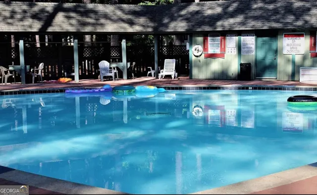 a view of a room with outdoor seating