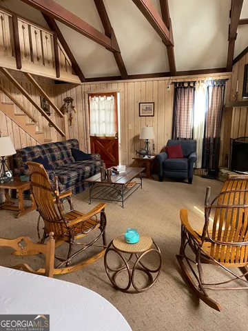 a living room with patio furniture