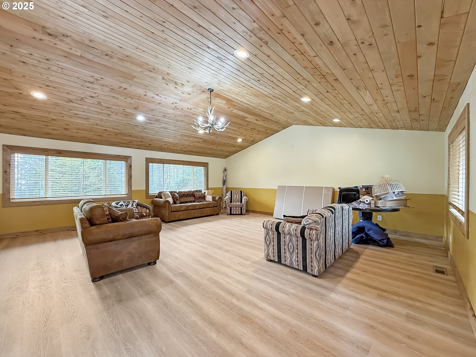 20313 Whaleshead Road Brookings, OR 97415 - Photo 14 of 41 a living room with furniture and a wooden floor