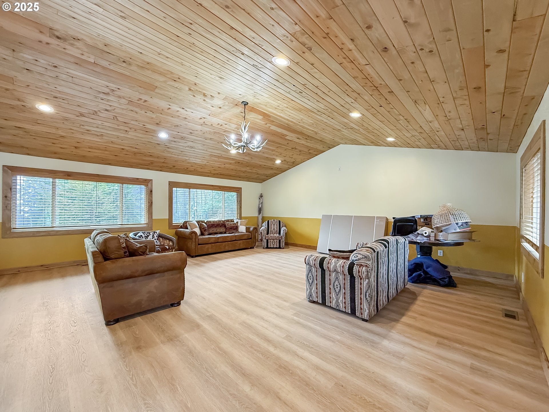 20313 Whaleshead Road Brookings, OR 97415 - Photo 15 of 41 a living room with furniture and a wooden floor