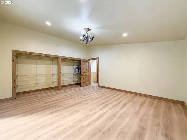 a kitchen with a sink and a refrigerator
