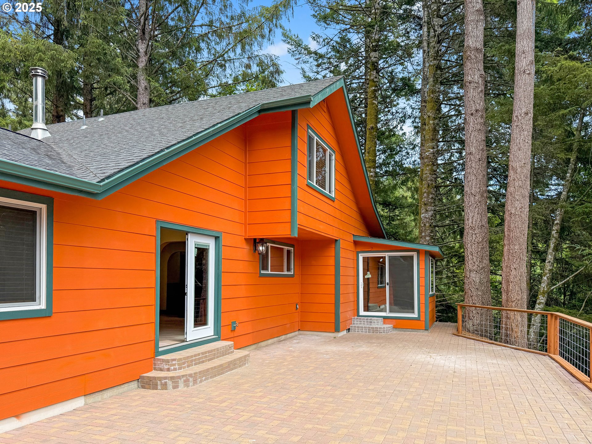 20313 Whaleshead Road Brookings, OR 97415 - Photo 5 of 41 a backyard of a house with seating space