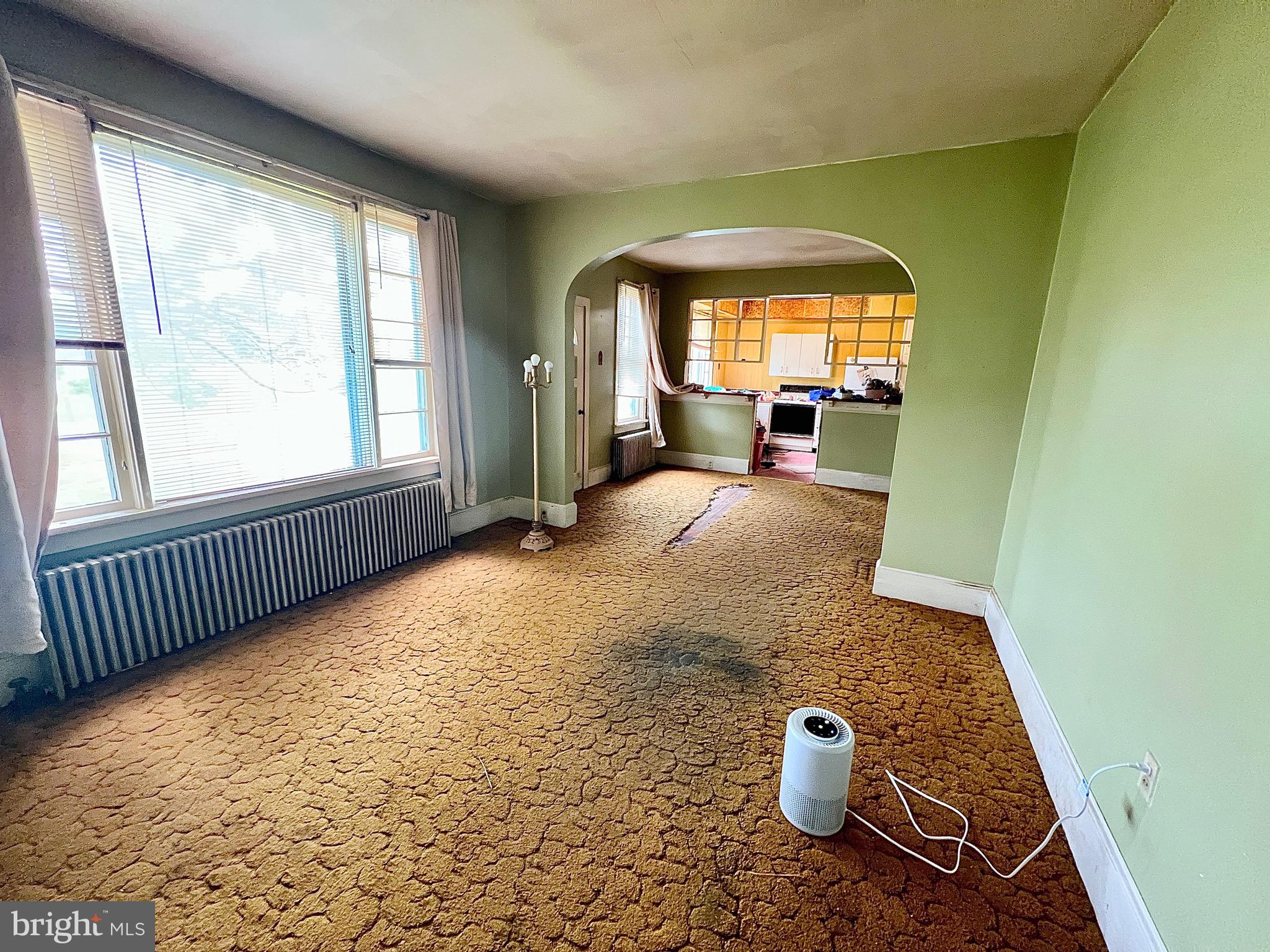280 Fairview Street Tamaqua, PA 18252 - Photo 15 of 26 a view of front door and bedroom with wooden floor