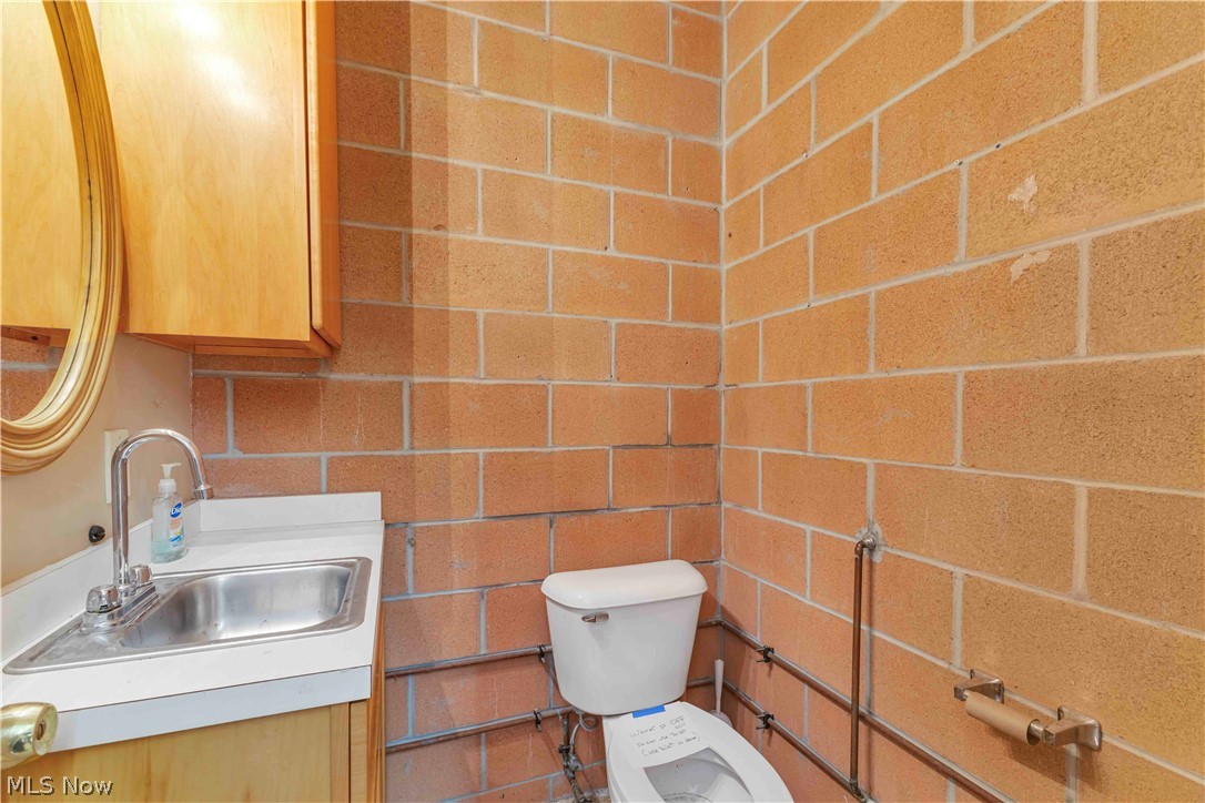5500 North Ridge Road Madison, OH 44057 - Photo 46 of 49 Building -Half bath featuring toilet and vanity