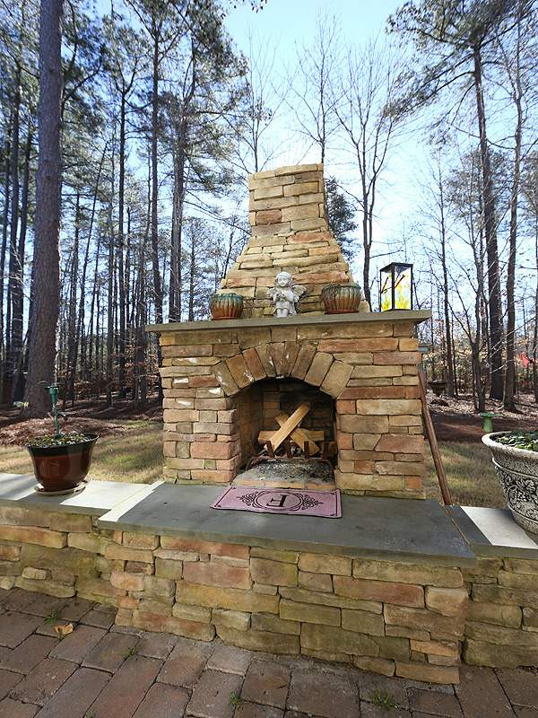 12913 Baybriar Drive Raleigh, NC 27613 - Photo 24 of 25 Roast some marshmallows, enjoy the fire and good conversation on the patio. Outdoor Fireplace