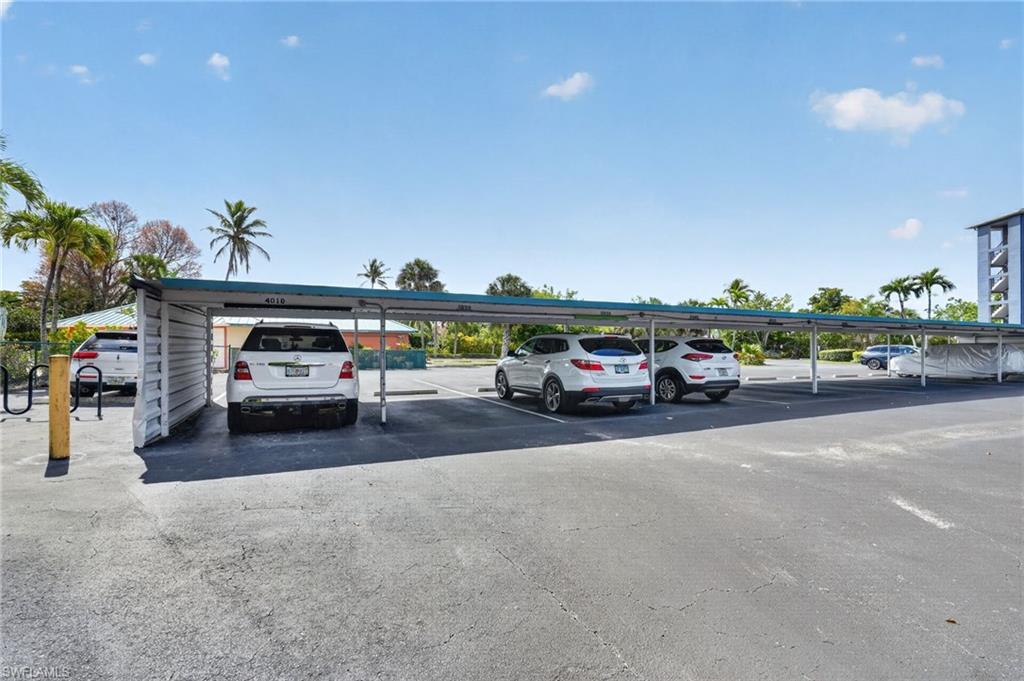 200 Pebble Beach Boulevard, Unit D103 Naples, FL 34113 - Photo 40 of 46 Carport