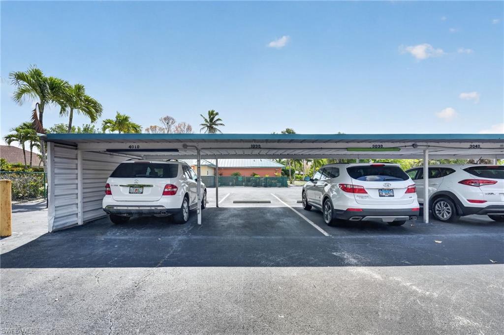 200 Pebble Beach Boulevard, Unit D103 Naples, FL 34113 - Photo 41 of 46 Carport