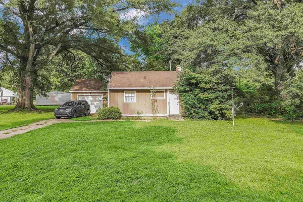 a house view with a garden space