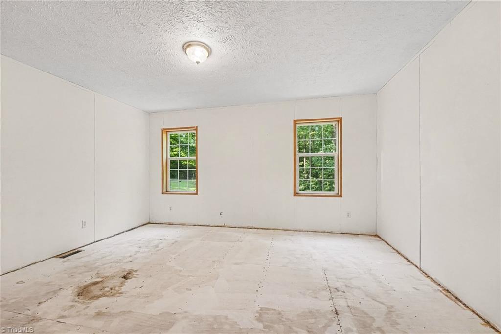 581 Candy Creek Road Reidsville, NC 27320 - Photo 16 of 36 Primary Bedroom