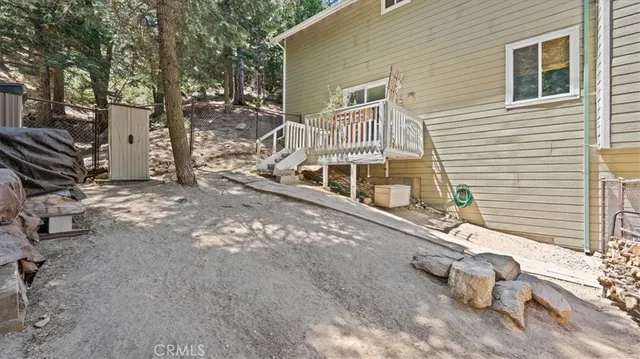 a front view of a house with yard