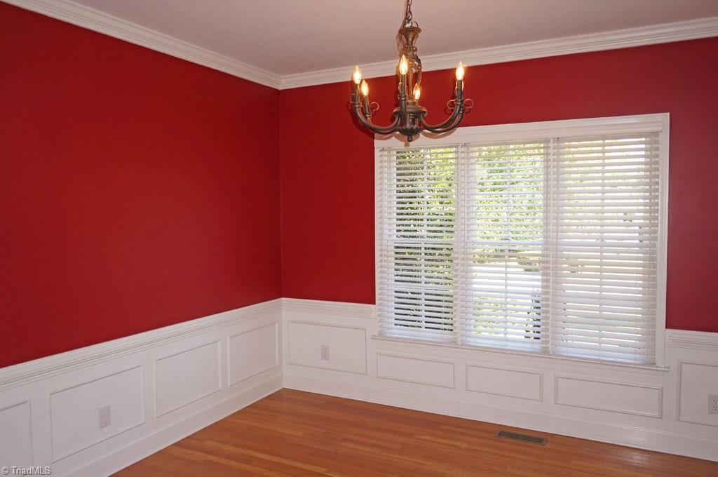 5250 Mountain View Road Winston-Salem, NC 27104 - Photo 11 of 26 Dining w/detailed wainscoting & crown molding.